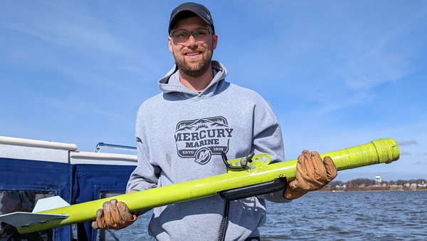 Dusty hold his yellow homebuilt towfish