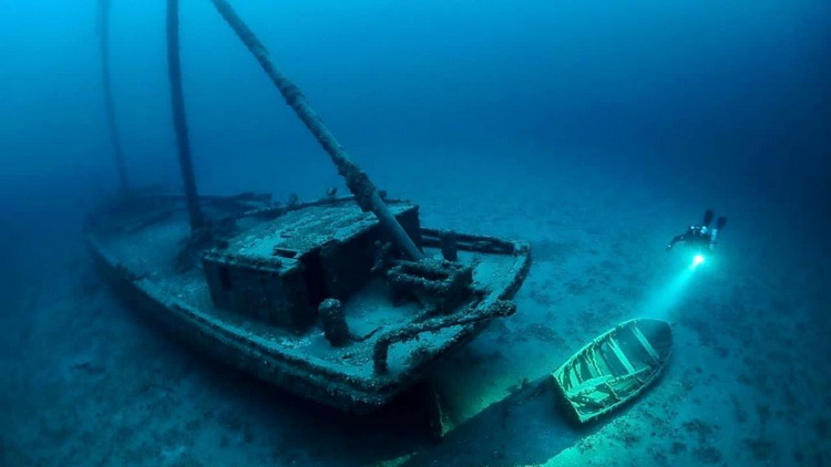 The Kimball with her lifeboat nearby